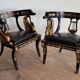 Pair of Empire-style bergère armchairs decorated with swans and lyres