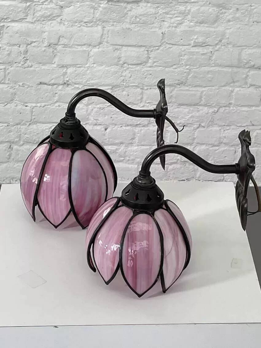 Pair of Tiffany style iron and glass leg wall lights