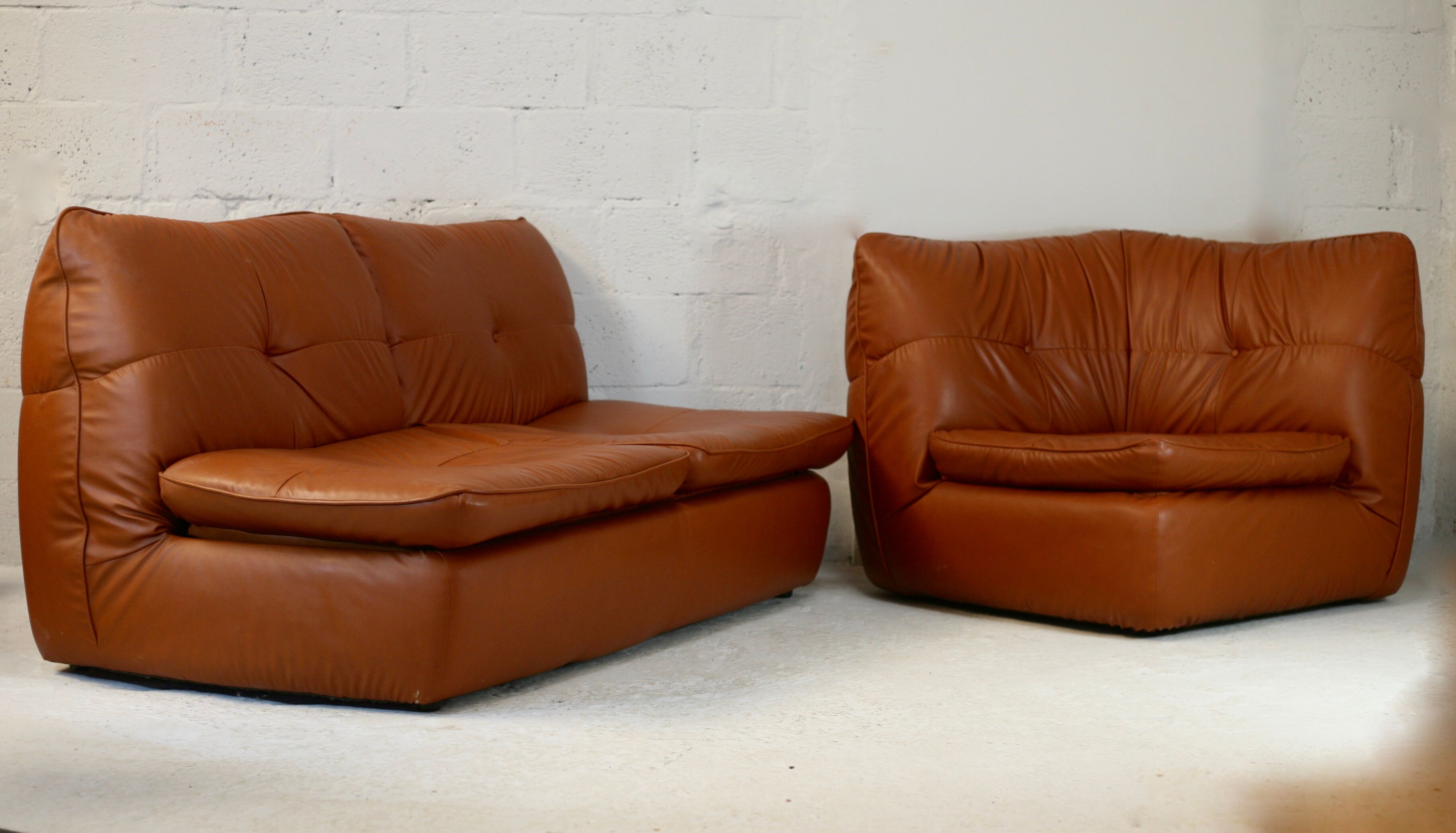 Imitation leather sofa "caramel". Convertible. France, circa 1990