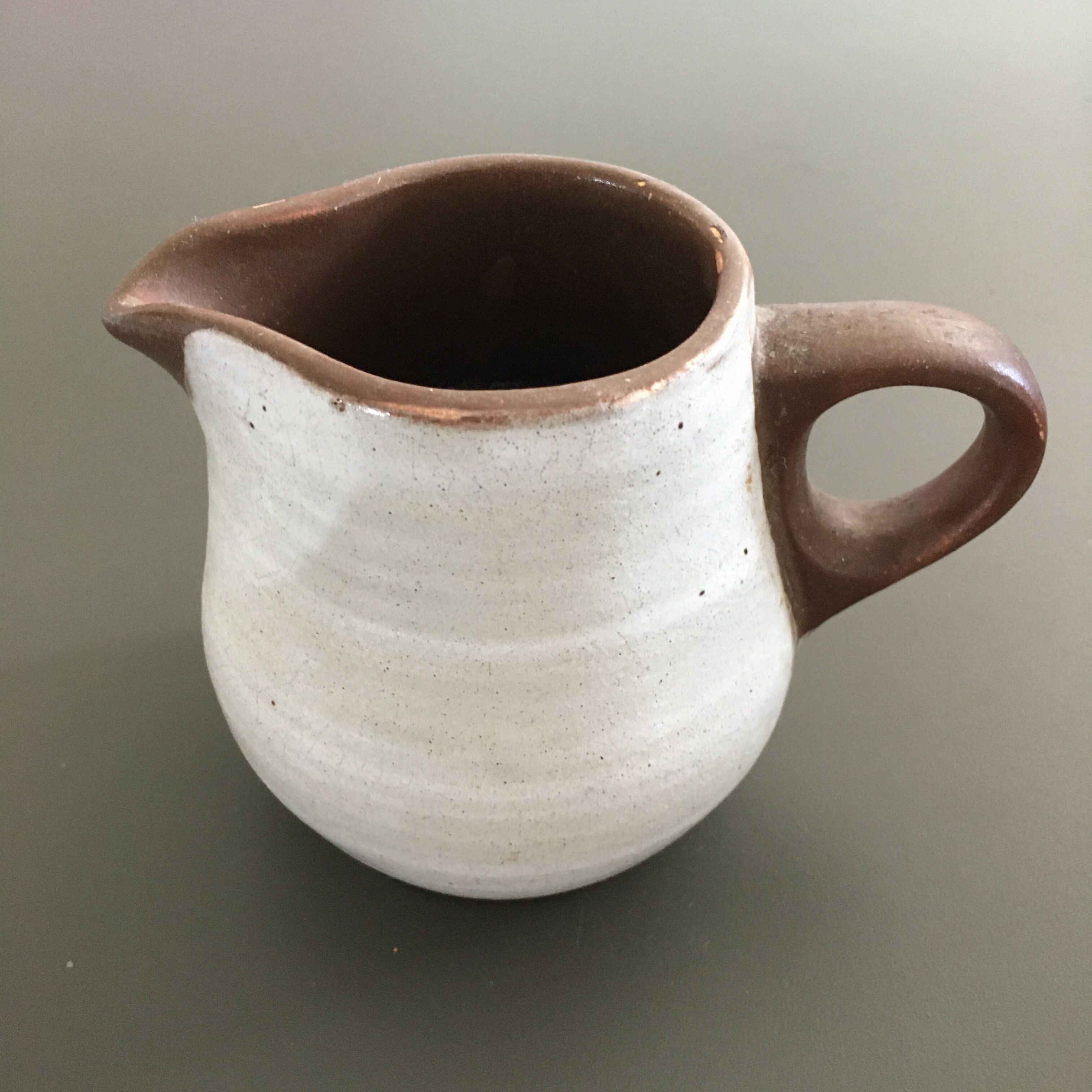 Pitcher patinated ivory sandstone