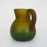 Pitcher in orange and green marble glass paste. Signed Georges De Feure for Daum