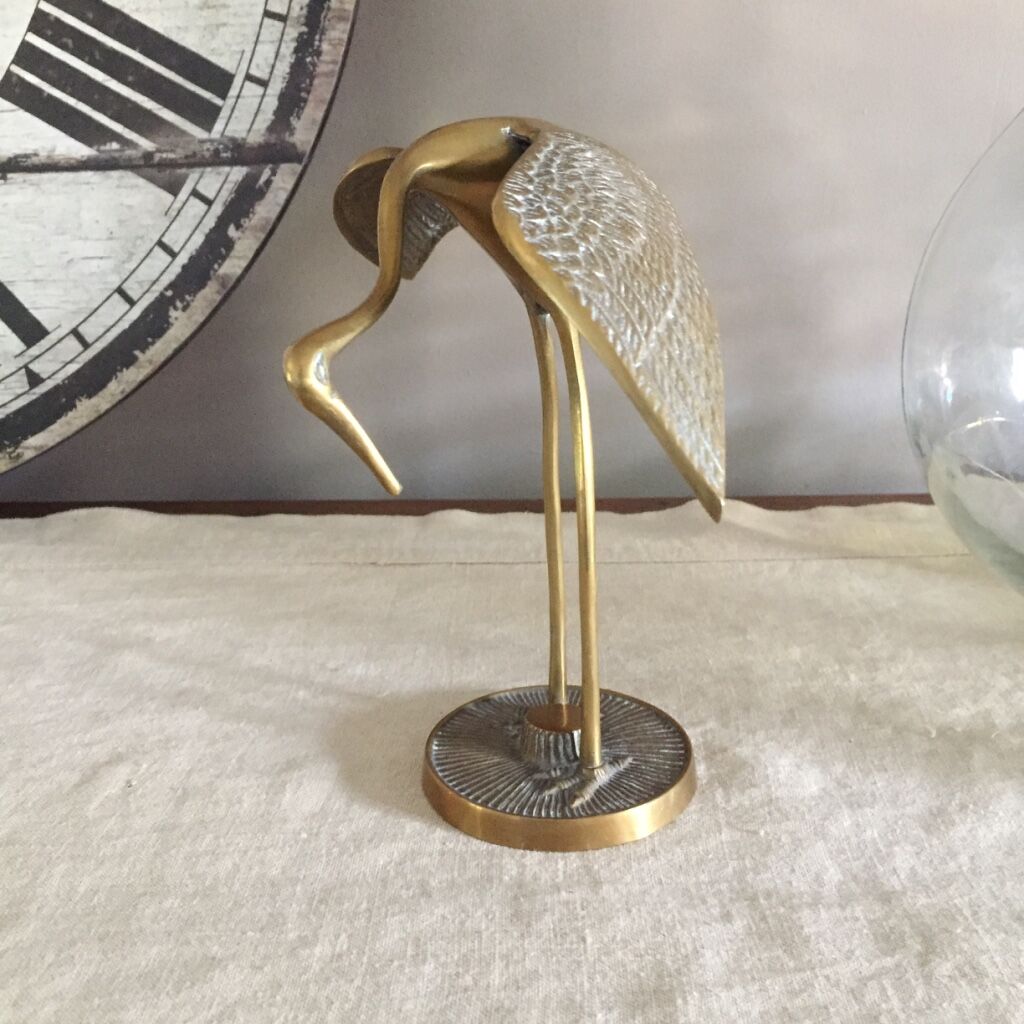 Couple of brass herons