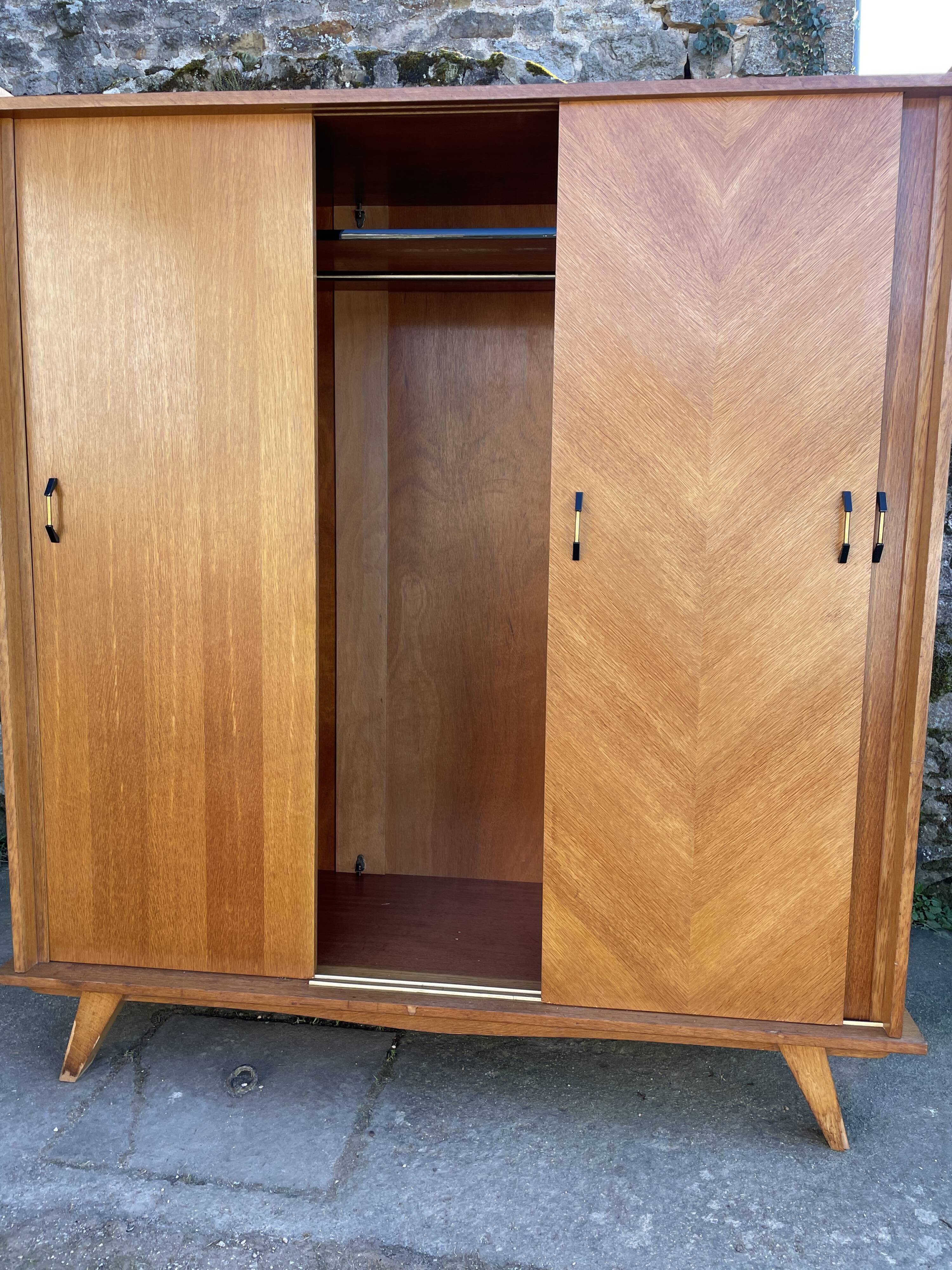 Light oak sliding door wardrobe, 1960