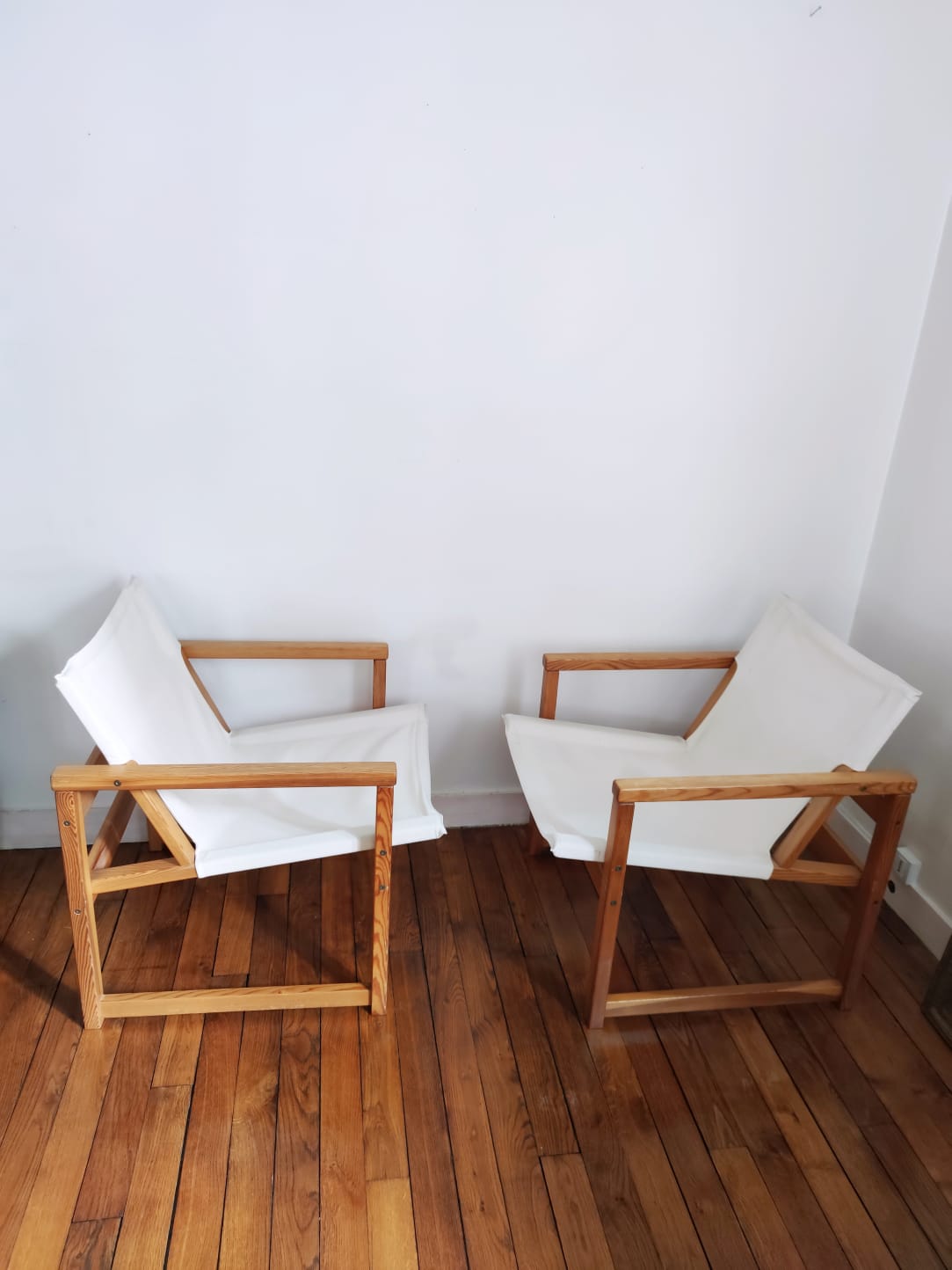 Paire de fauteuils toilés années 70