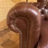 brown leather 2-seater Chesterfield sofa
