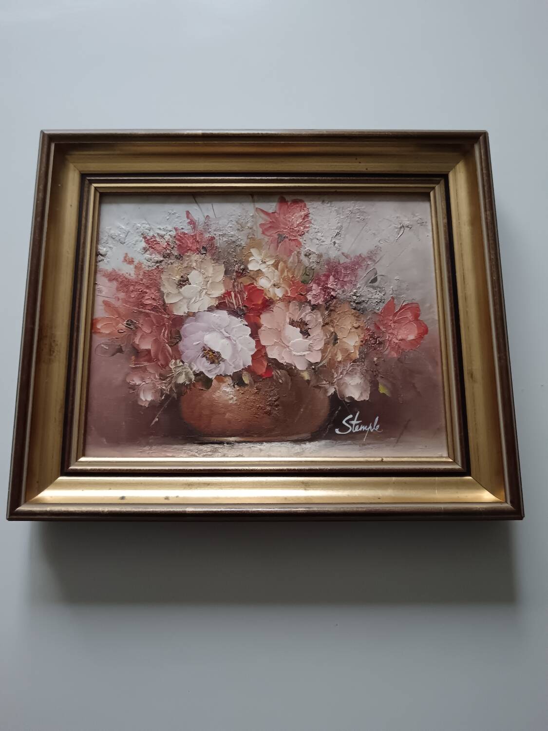 Oil of a bouquet and its lovely frame