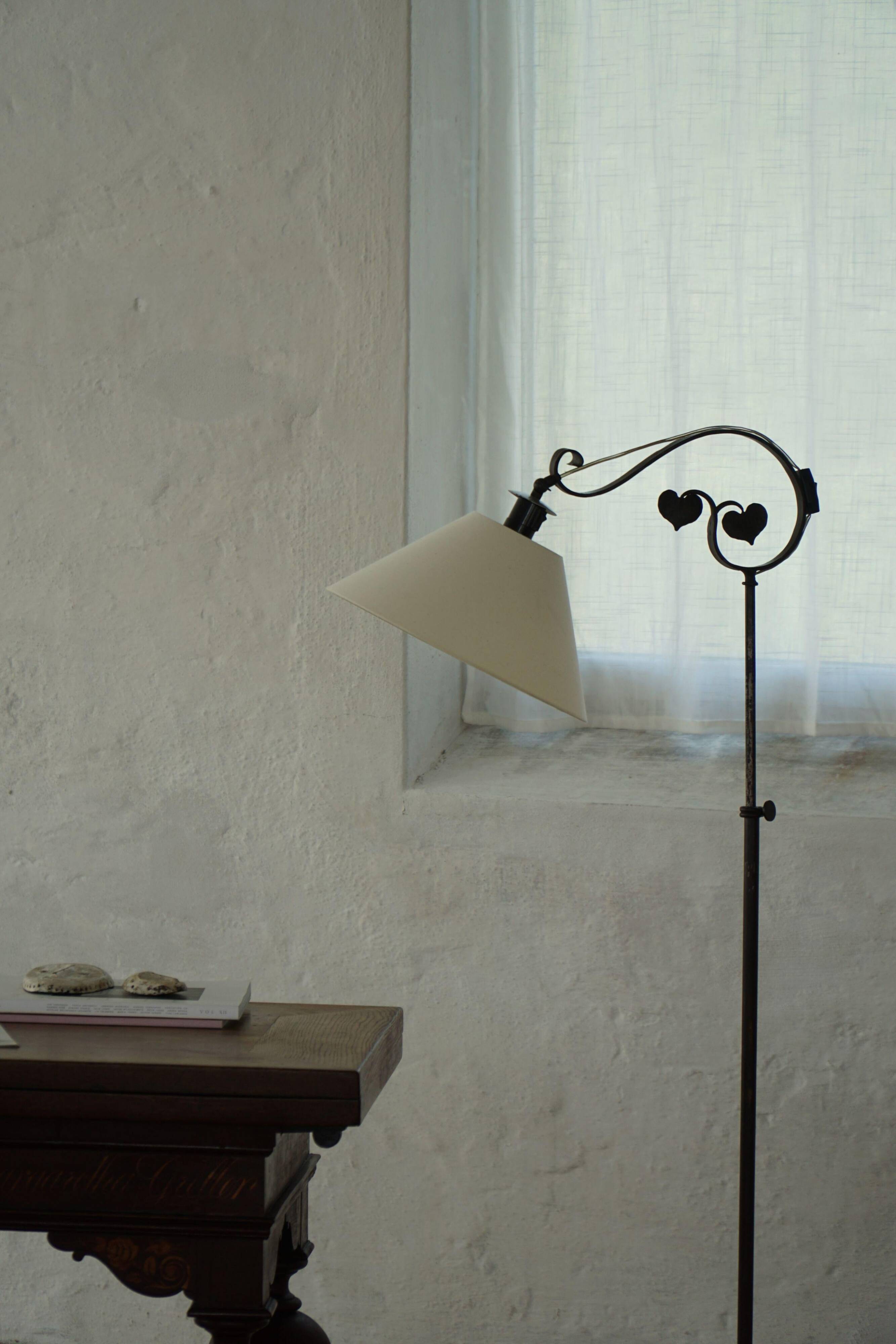 Danish Art Deco, adjustable wrought iron floor lamp, 1930s