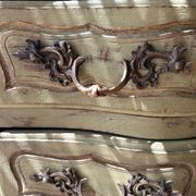 Curved antique commode in pistachio green patina.