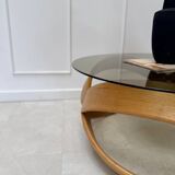 Smoked glass and curved wood coffee table