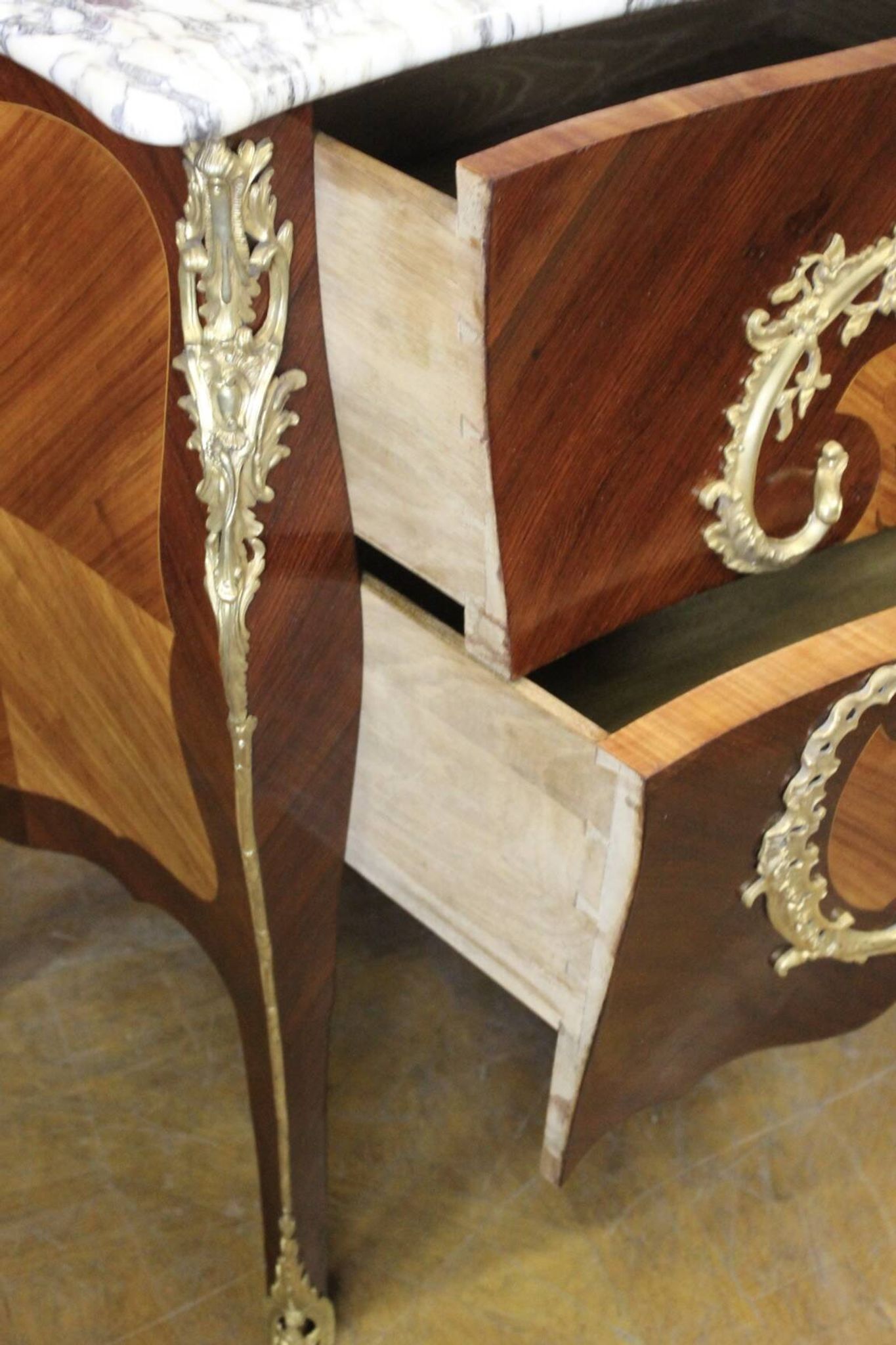 Louis XV style commode in marquetry around 1900