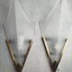 Pair of Art Deco wall sconces in frosted pressed glass.