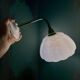 Vintage glass wall light with a curved arm from Clichy, white.