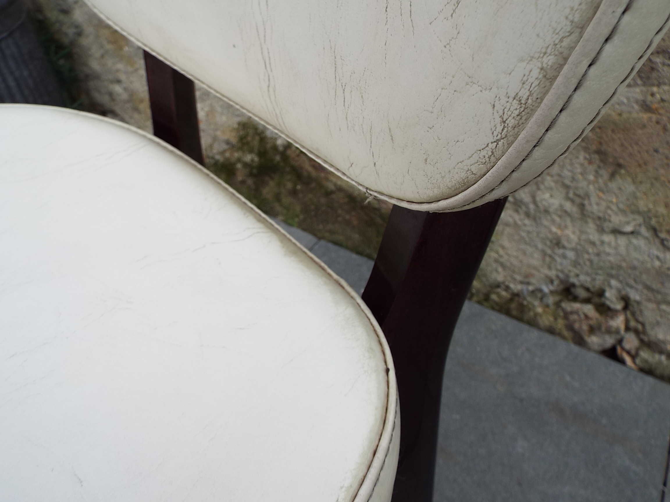 2 skai and wooden chairs