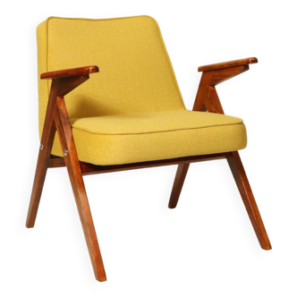Fauteuil scandinave design rétro tissu moelleux jaune chaise de salon en bois design par Chierovsky