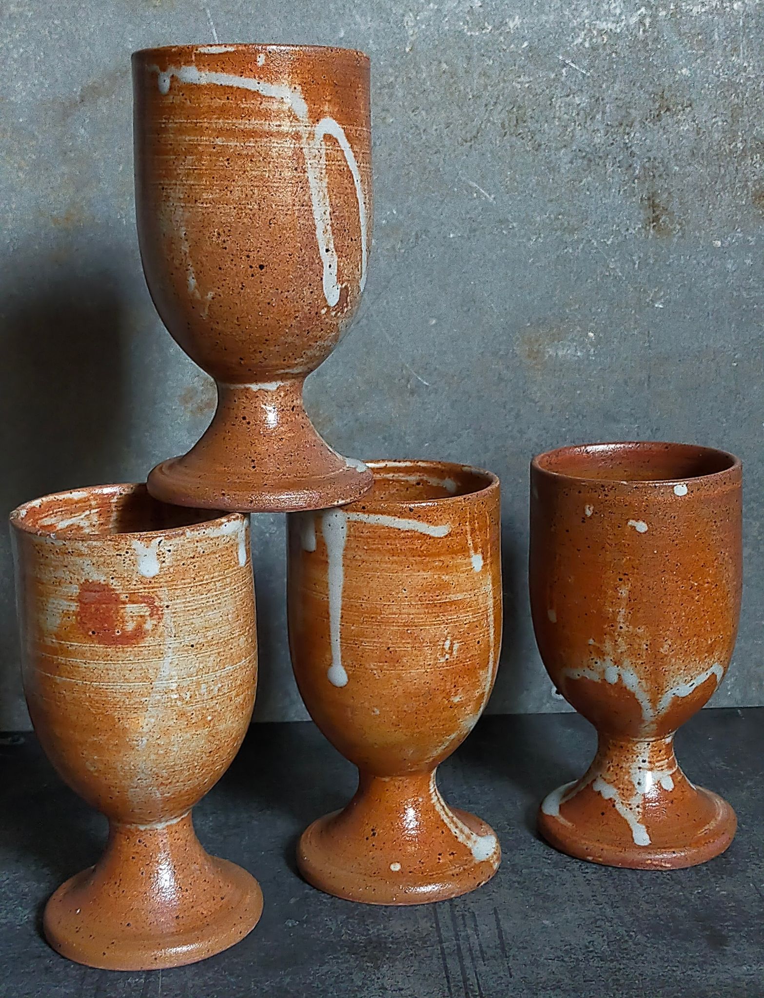 Four potter's mugs turned in vintage light stoneware
