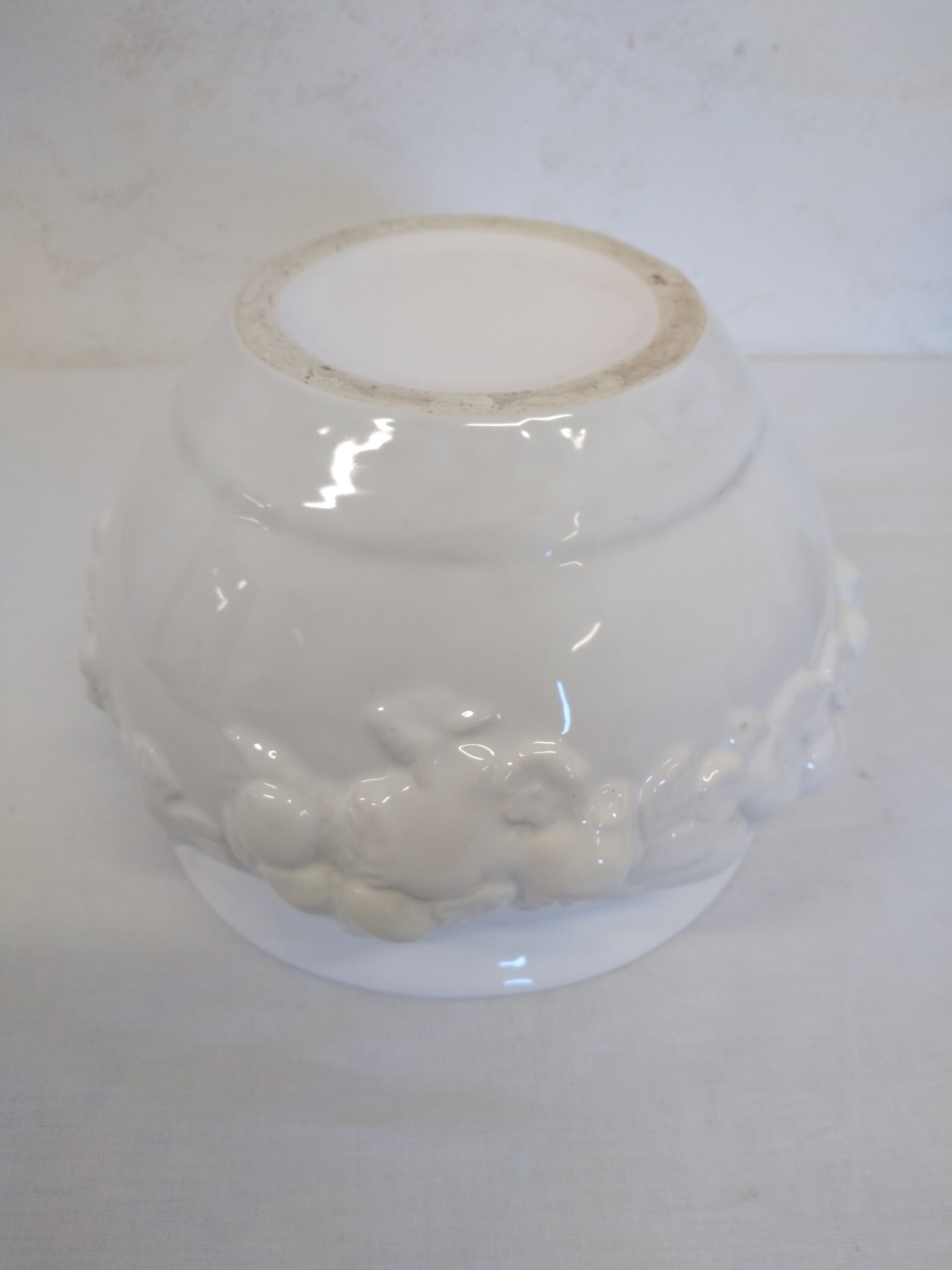 Old pot cover in slip