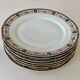Set of 7 flat plates in Limoges porcelain