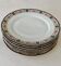 Set of 7 flat plates in Limoges porcelain