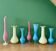 Set of 7 vintage opaline vases/soliflores.