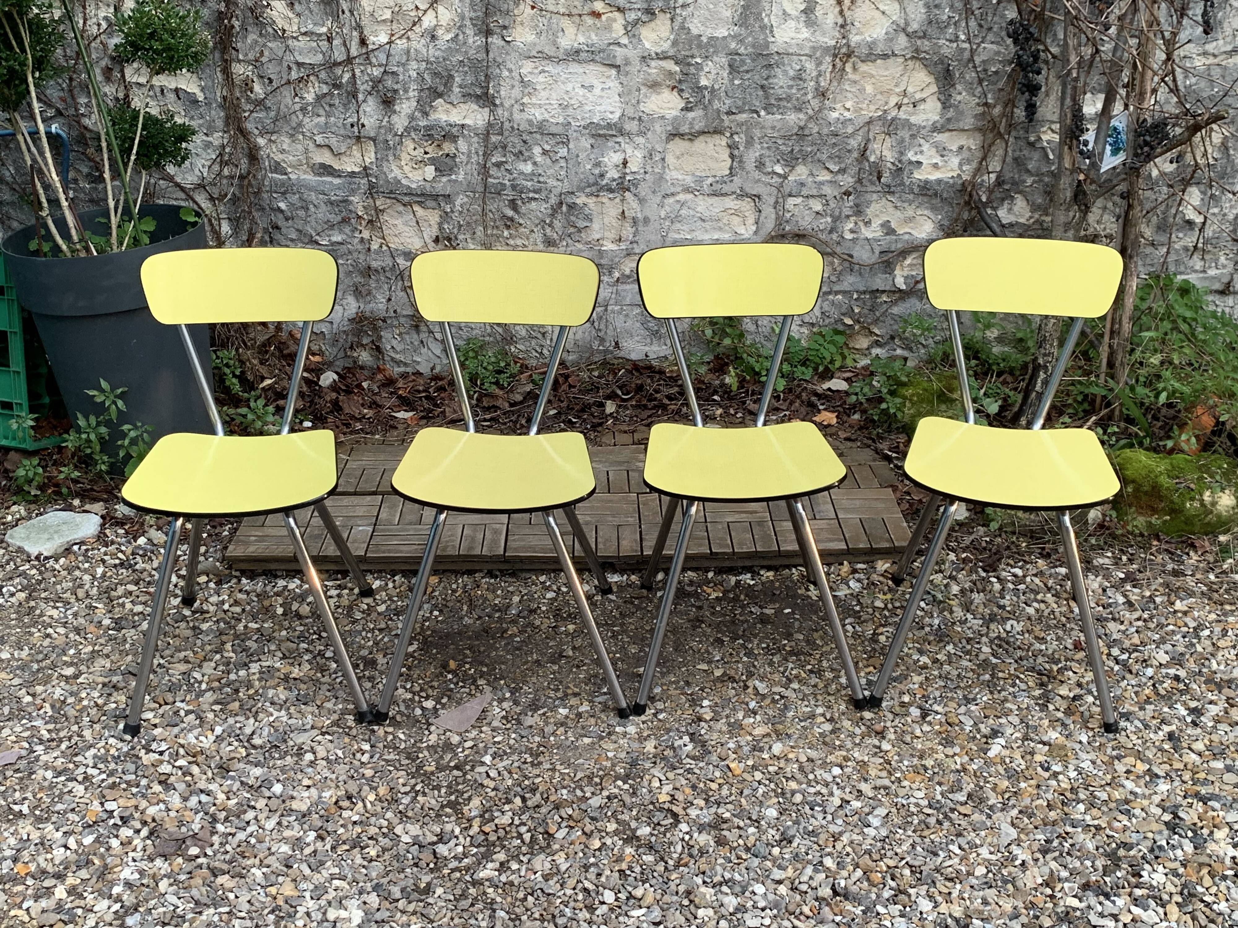 Yellow Formica chairs with compass legs, 1950s