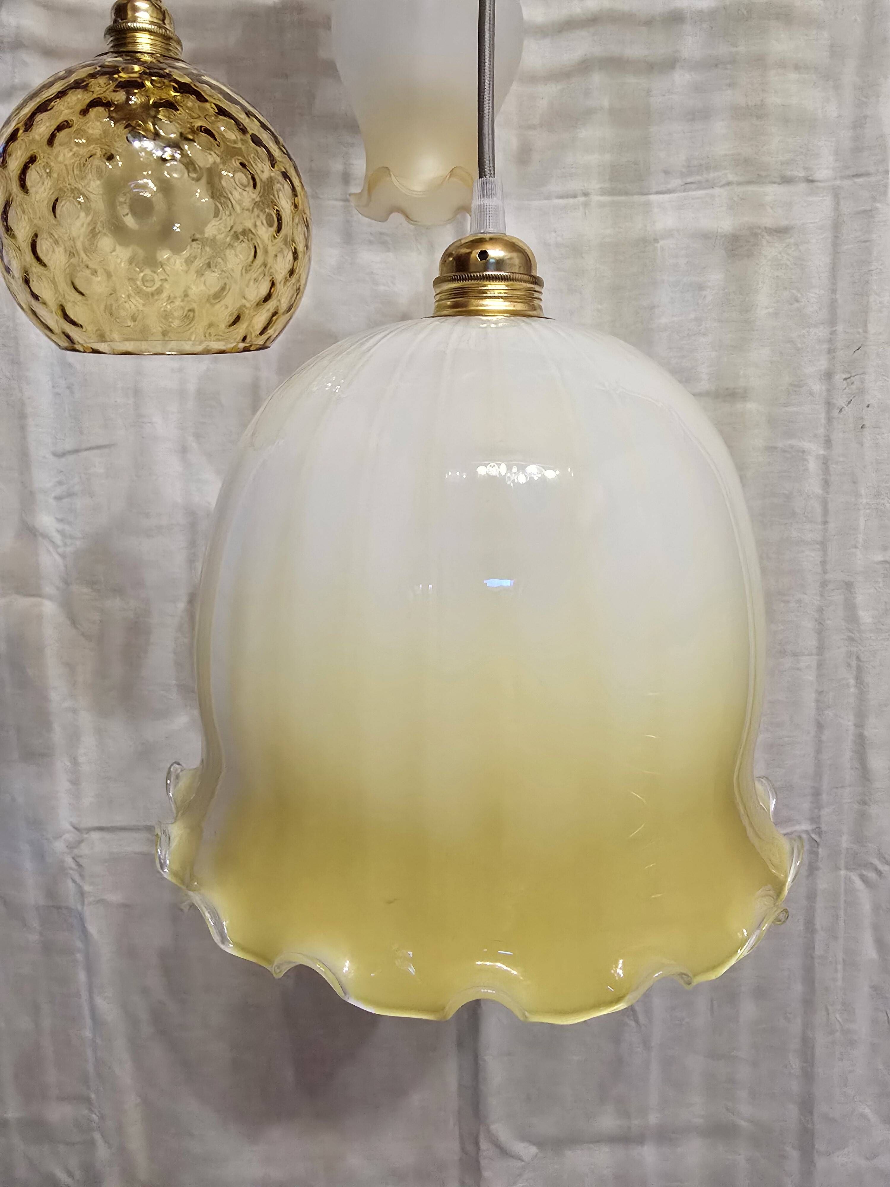 Suspension triple opaline with engraved and frosted glass in shades of yellow-orange.