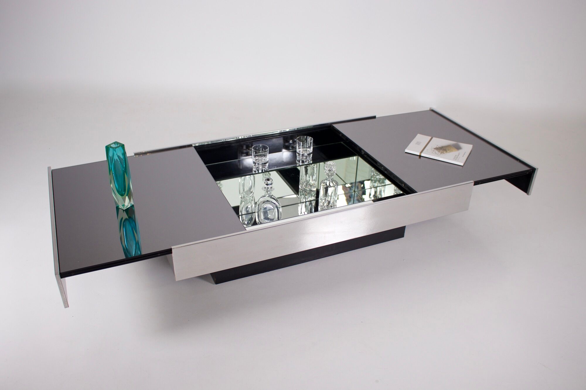 Opening coffee table in bar, Rizzo & Cidue 1970.