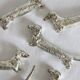 6 dog dachshund knife holders in vintage silver color metal