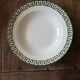 Set of 12 green patterned soup plates, Badonviller earthenware