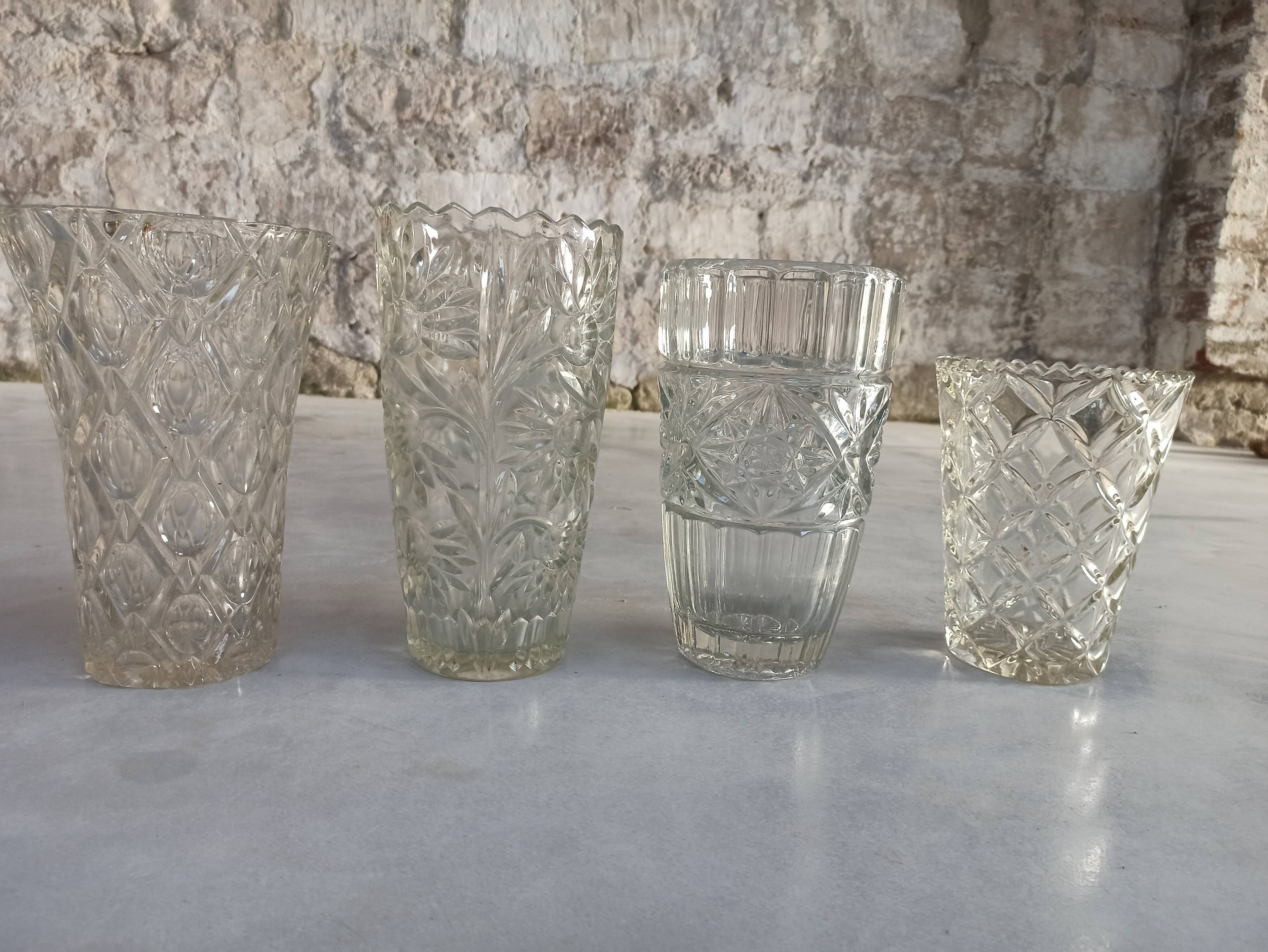 Four bohemian crystal vases