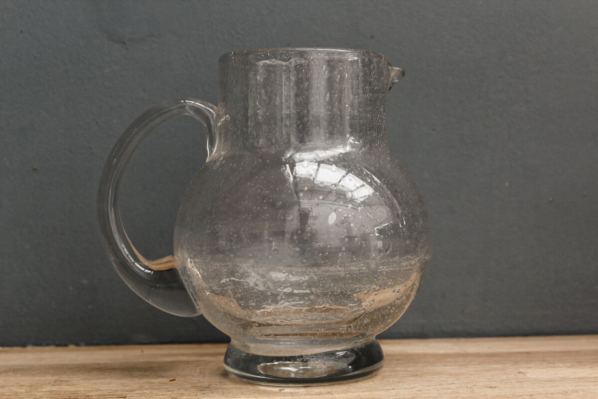 Decanter made of bubbled glass, blown