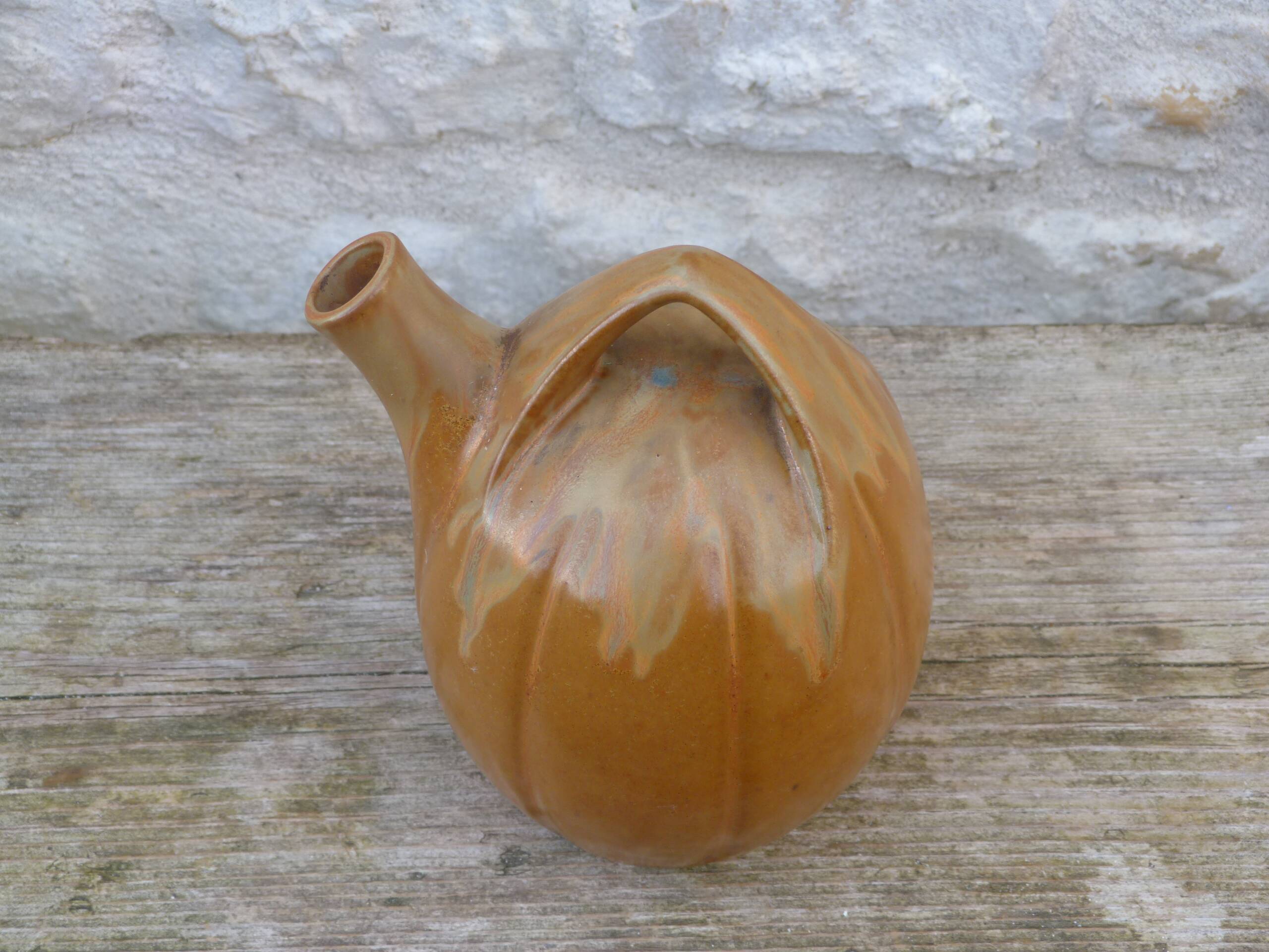 Vintage brown flamed stoneware jug signed Denbac.