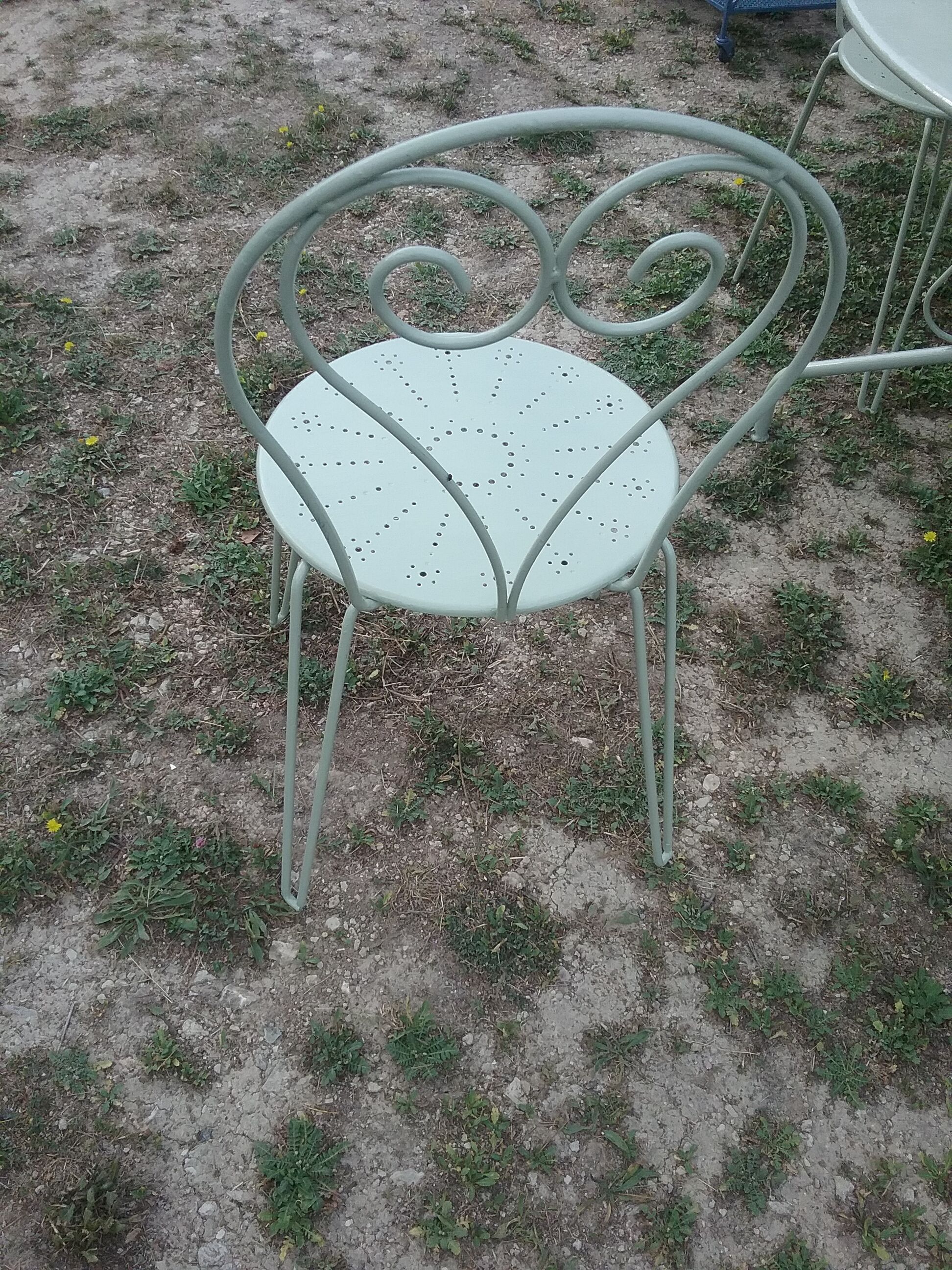 Green wrought iron garden furniture