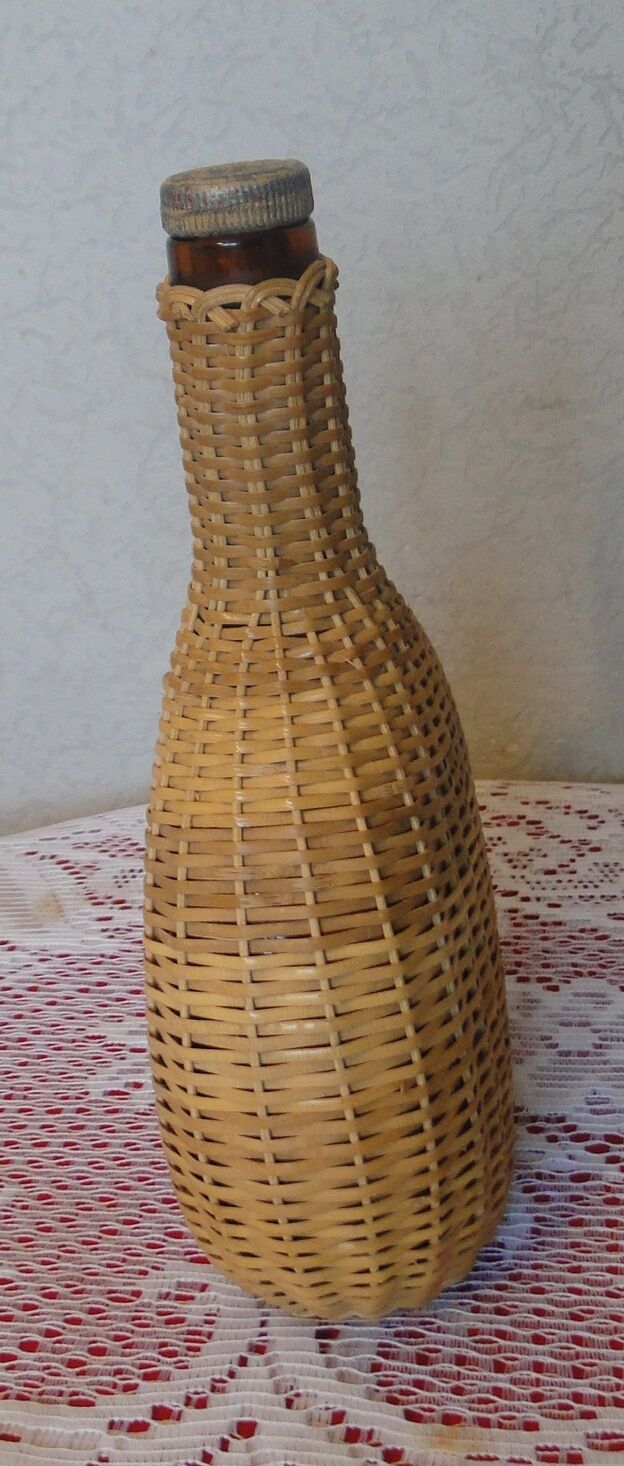 Vintage wicker covered flat bottle