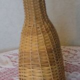 Vintage wicker covered flat bottle