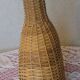 Vintage wicker covered flat bottle
