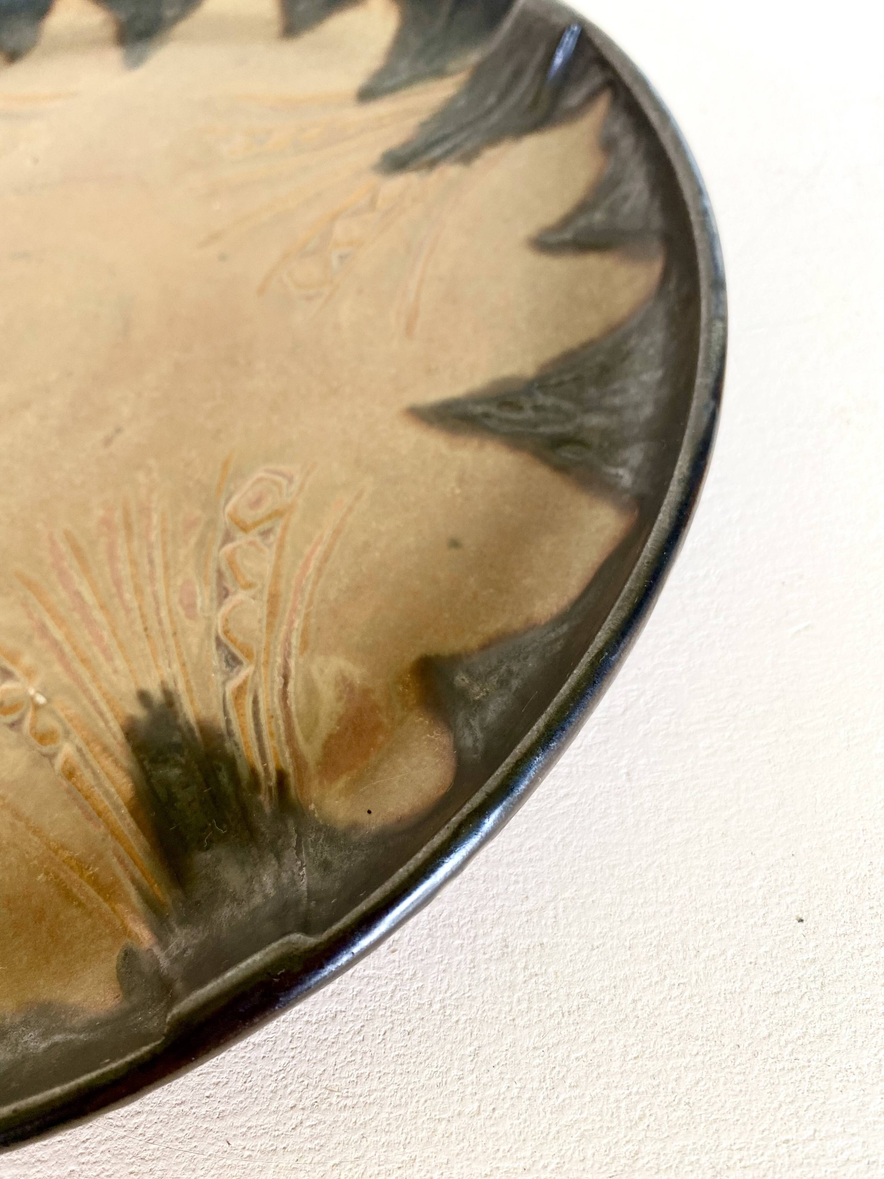 Denbac plate, flame-decorated ceramic