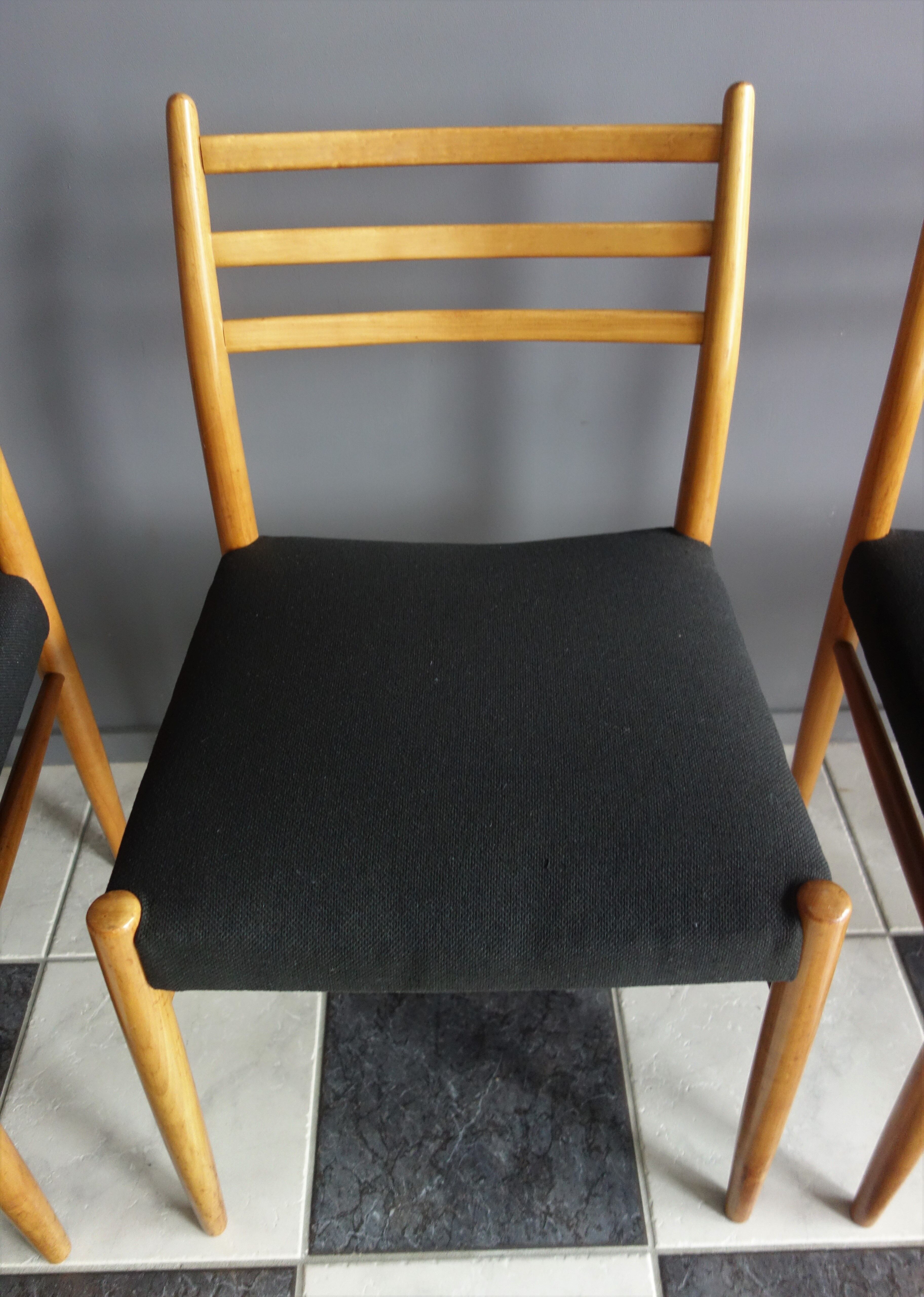 Set of 4 dining chairs in wood and black fabric 1960s