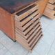 Workshop furniture with drawers and curtain in beech and walnut.