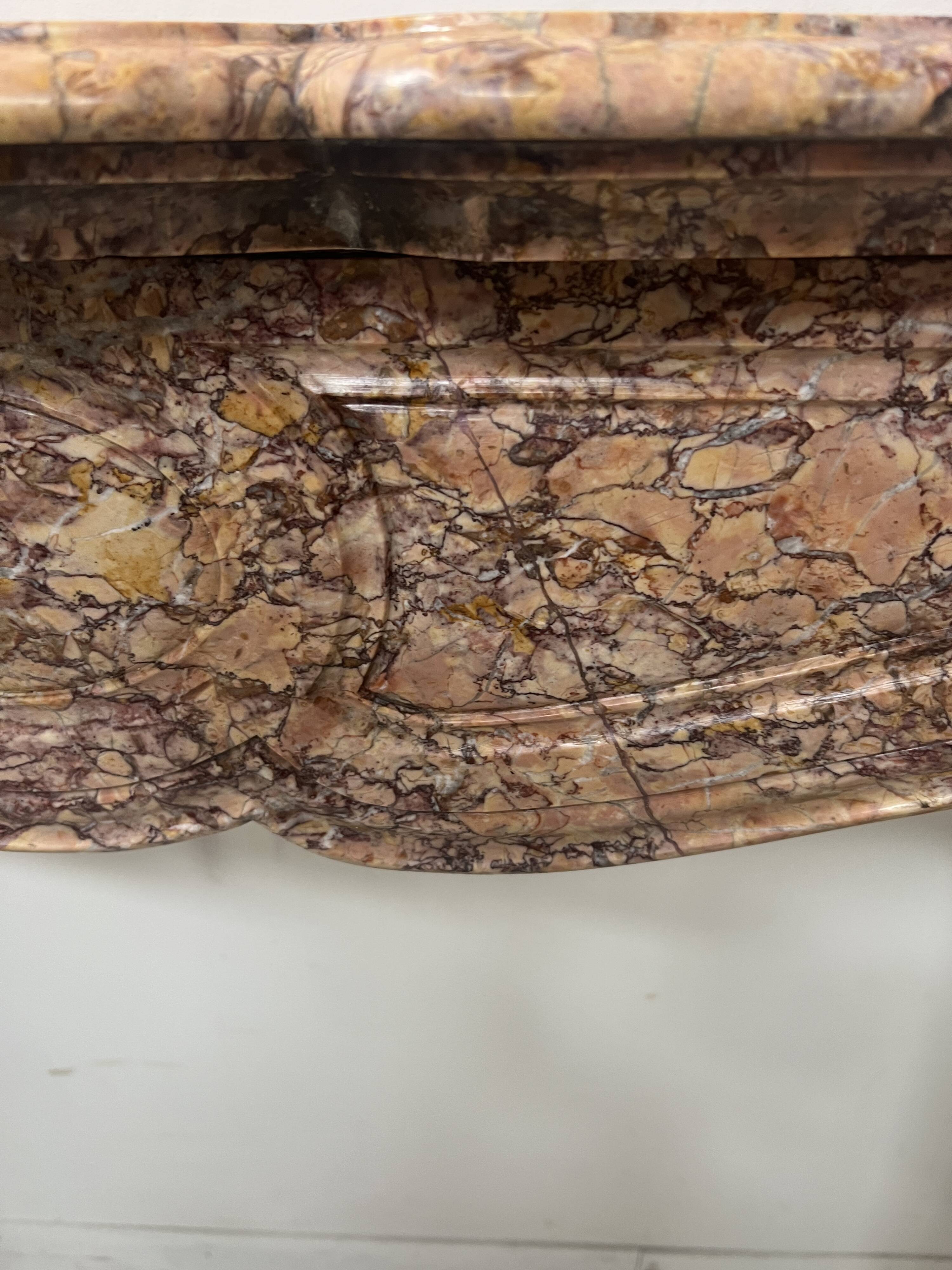 Louis XV style fireplace, Pompadour model, speckled breccia marble, 19th century