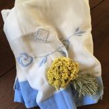 Embroidered cotton linen sheet with blue border