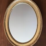 Miroir ovale doré 37x46cm