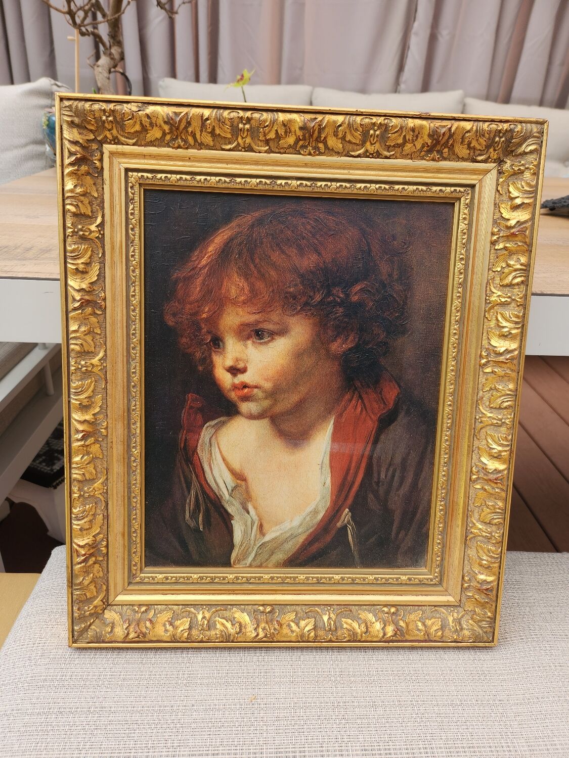 Painting the blond child Greuze