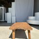 Coffee table in blond teak quadripod