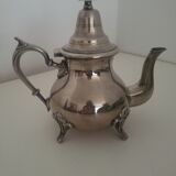 Oriental teapot in silver metal