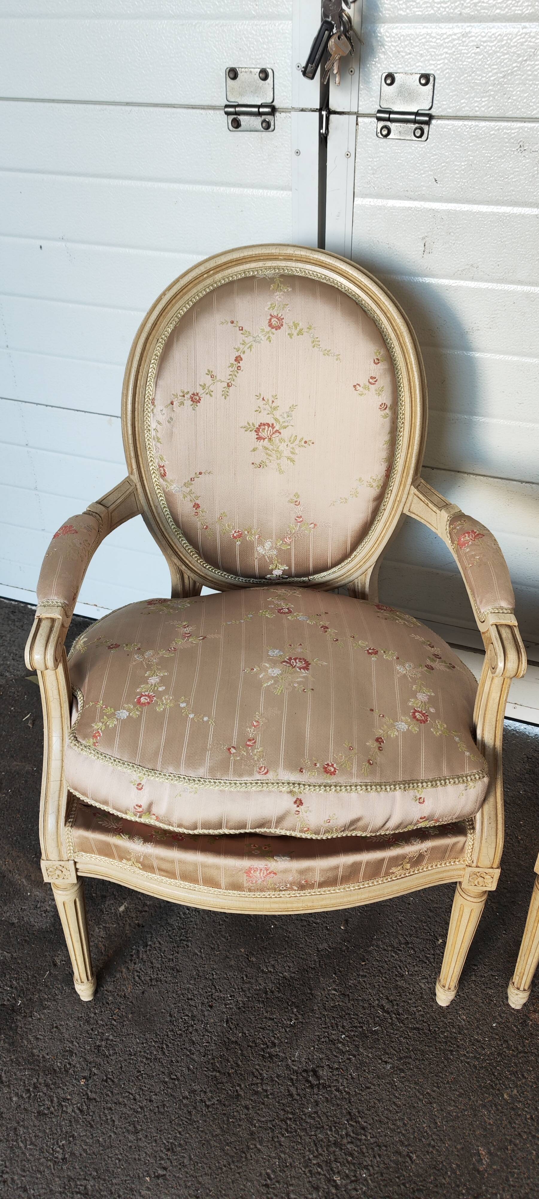 Old pair of Louis XVI style armchairs