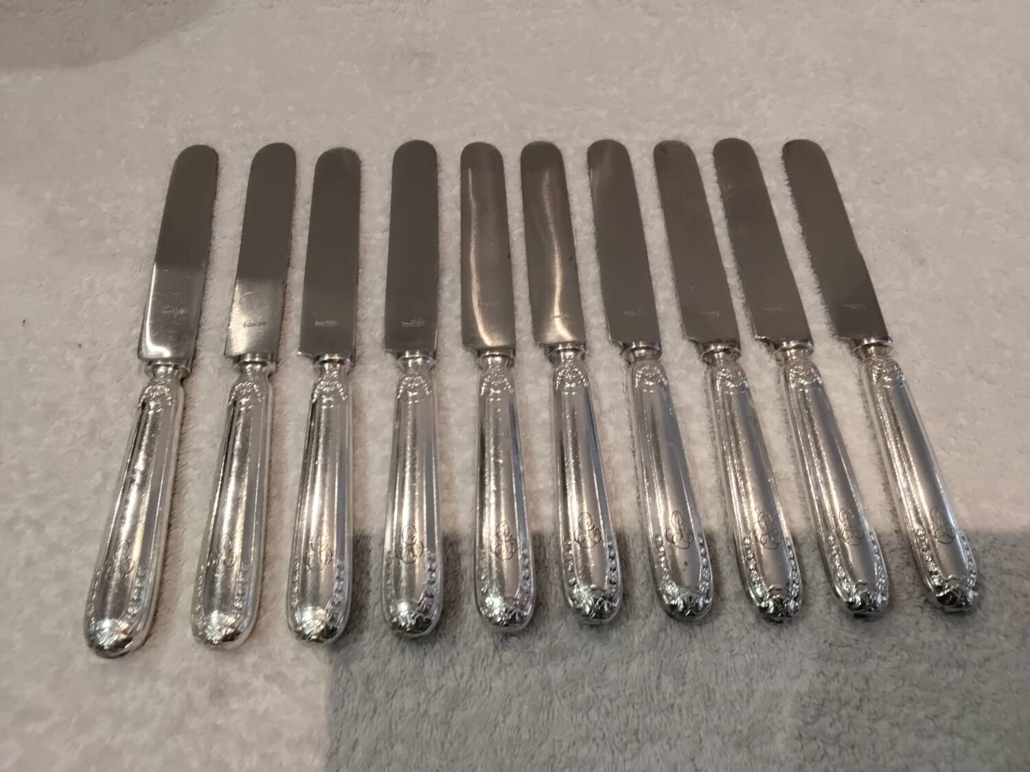 10 silver-plated dessert knives, Empire style, French work?