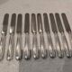 10 silver-plated dessert knives, Empire style, French work?