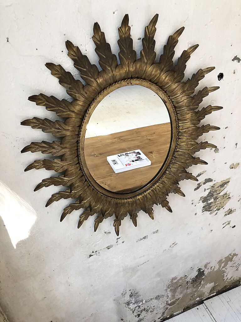 Golden mirror ancient flowery sun