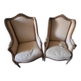 Pair of restored Louis XV wingback armchairs – new fabric