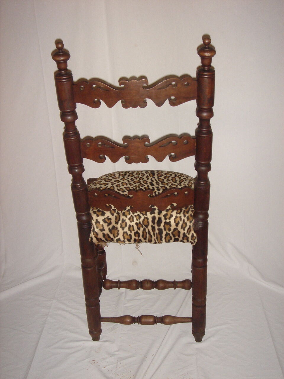 Old chair covered Leopard fabrics